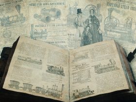 otvorená kniha a plány na parný stroj